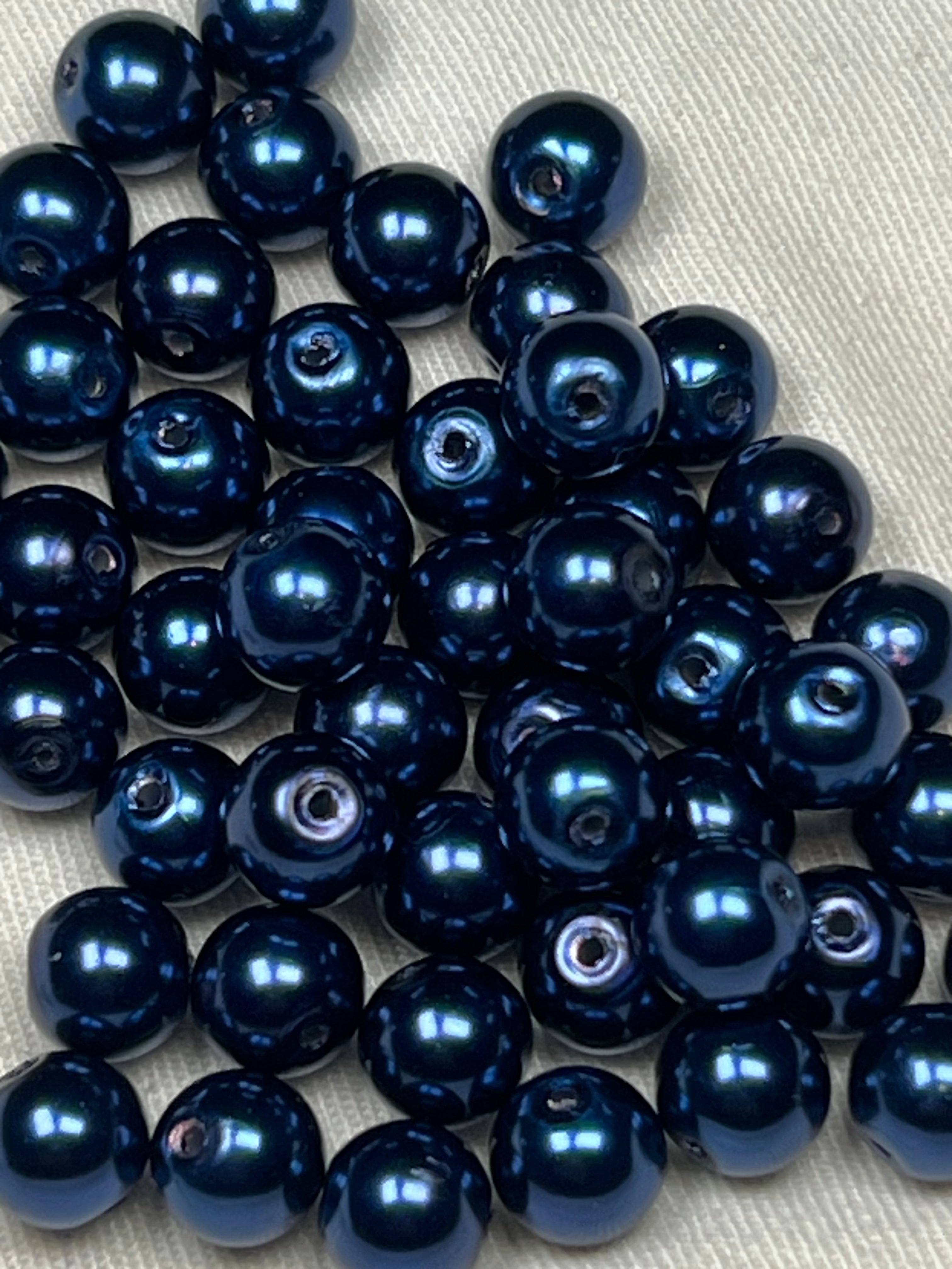 50 steel blue 8mm glass pearl beads.