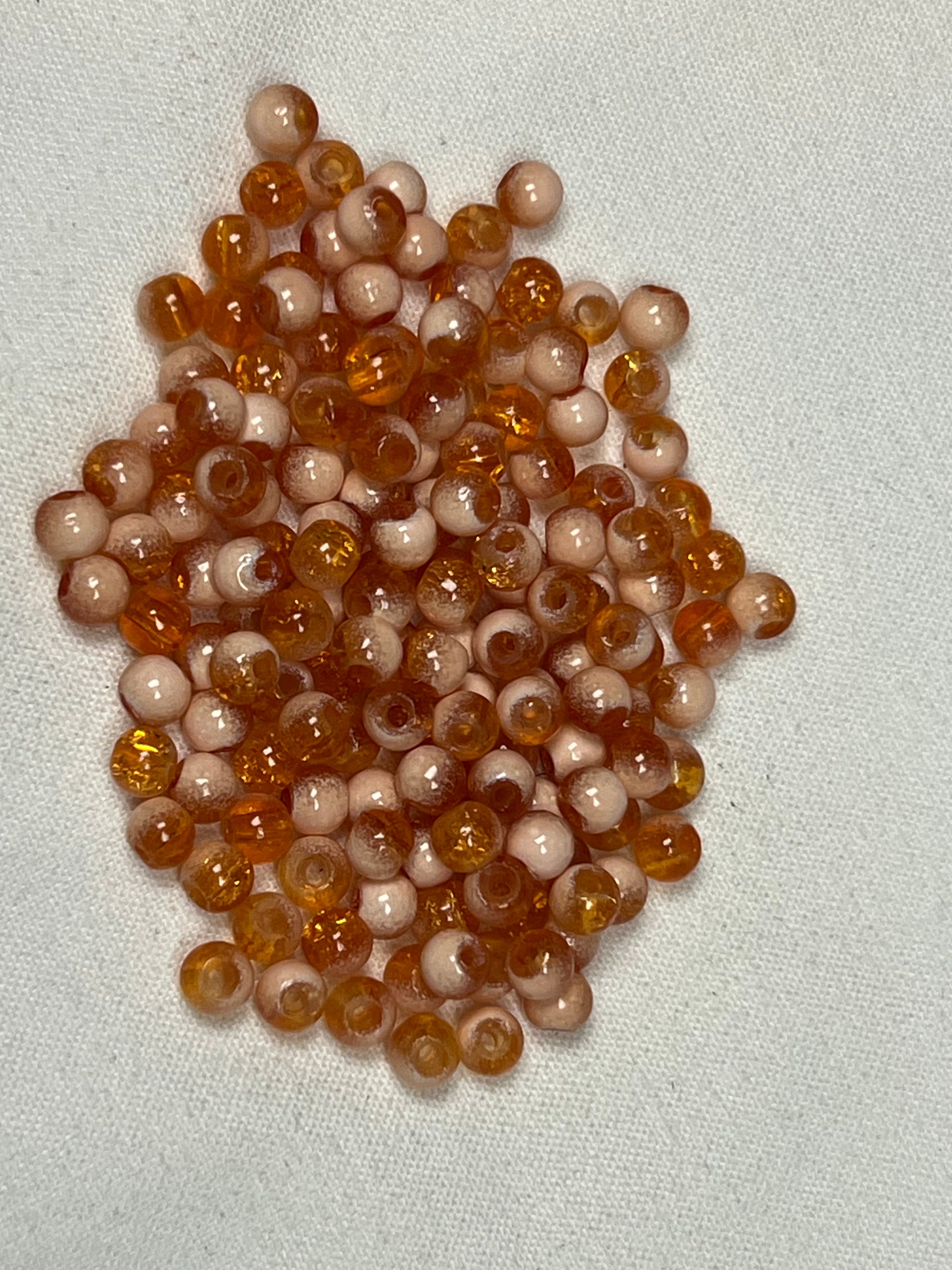 300 4.5mm orange-red and white crackle glass beads.