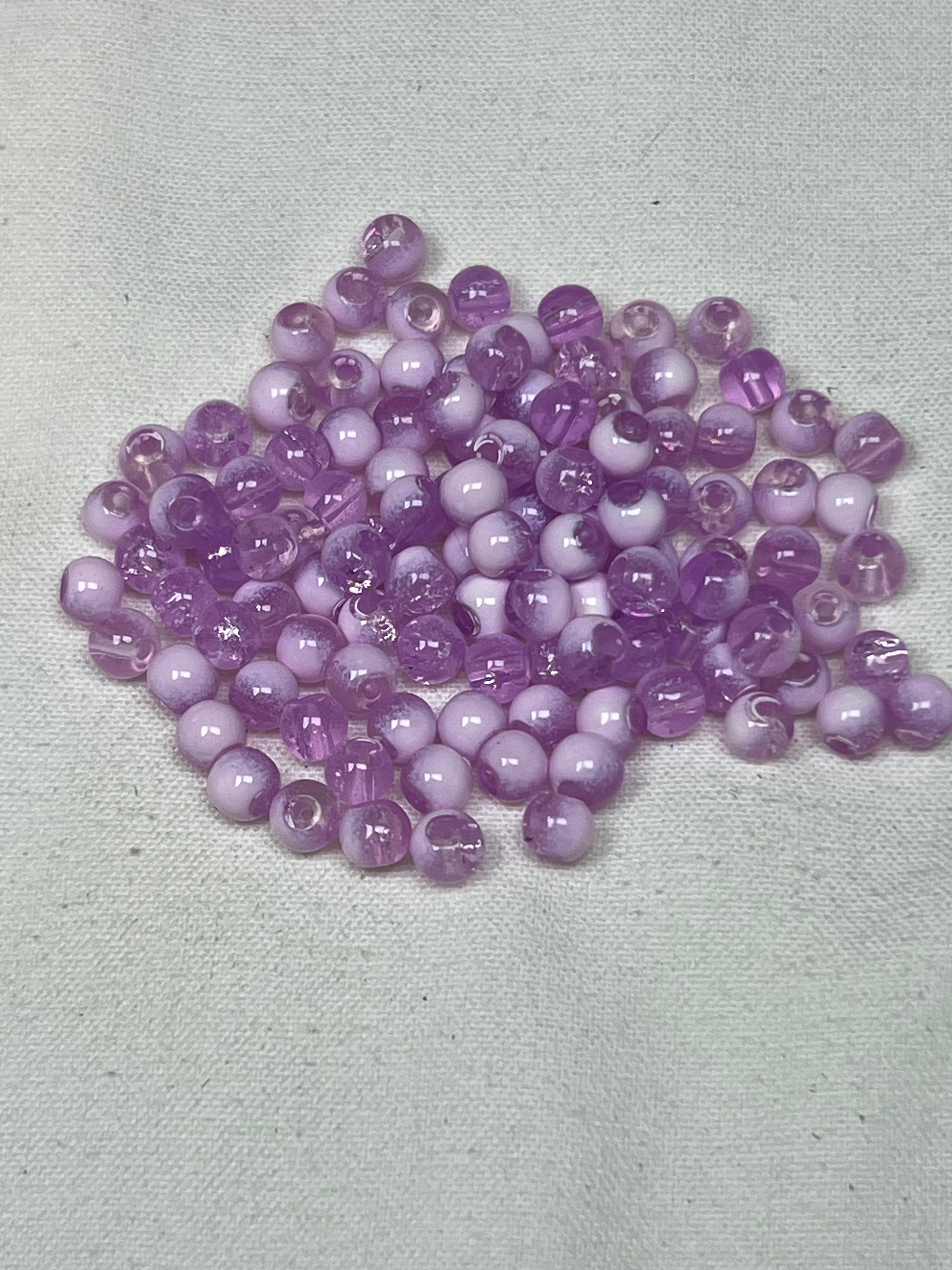 300 4.5mm crackle glass beads in medium purple and white.