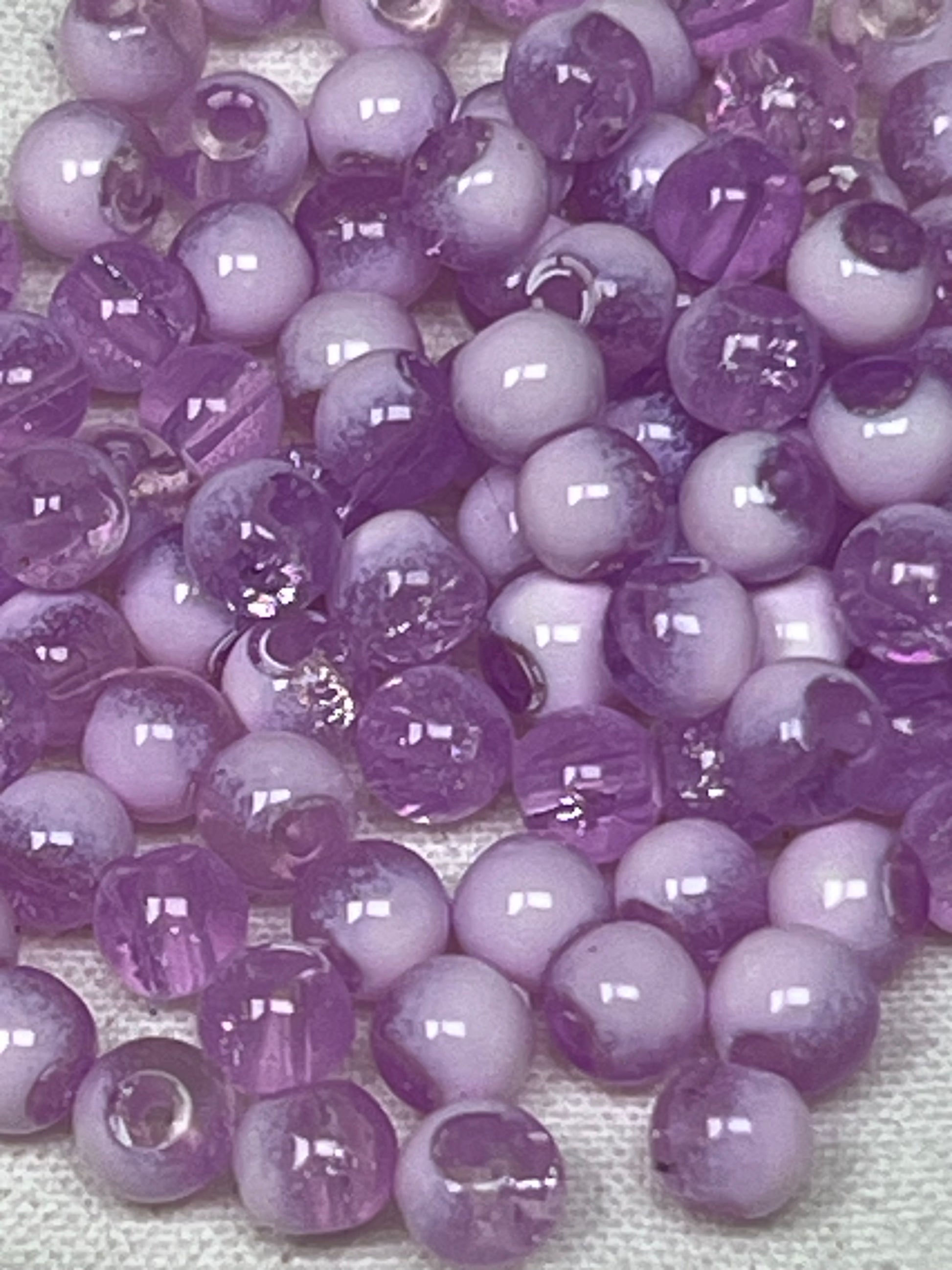 300 4.5mm medium purple and white crackle glass beads.