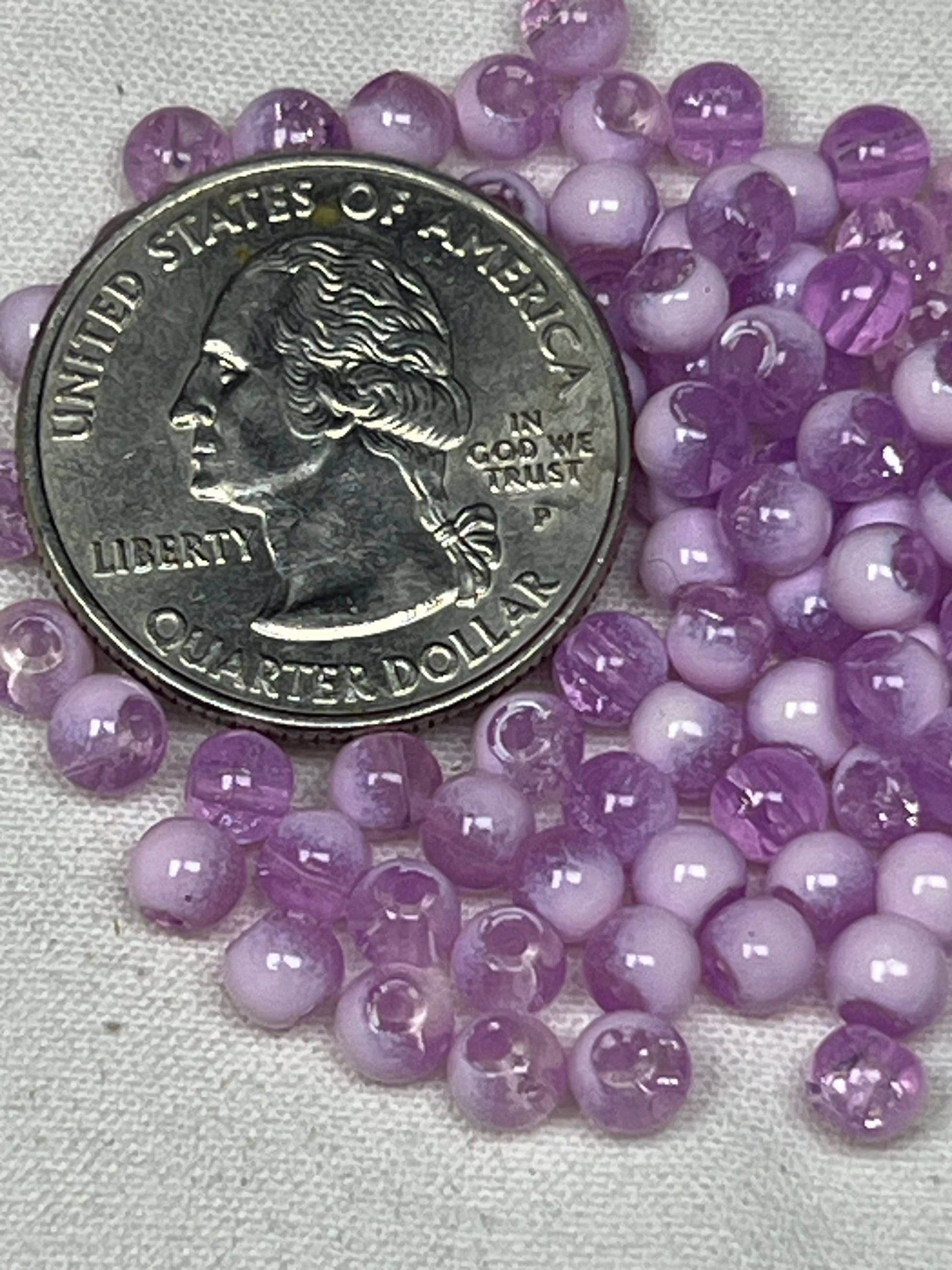 300 medium purple and white 4.5mm crackle glass beads.