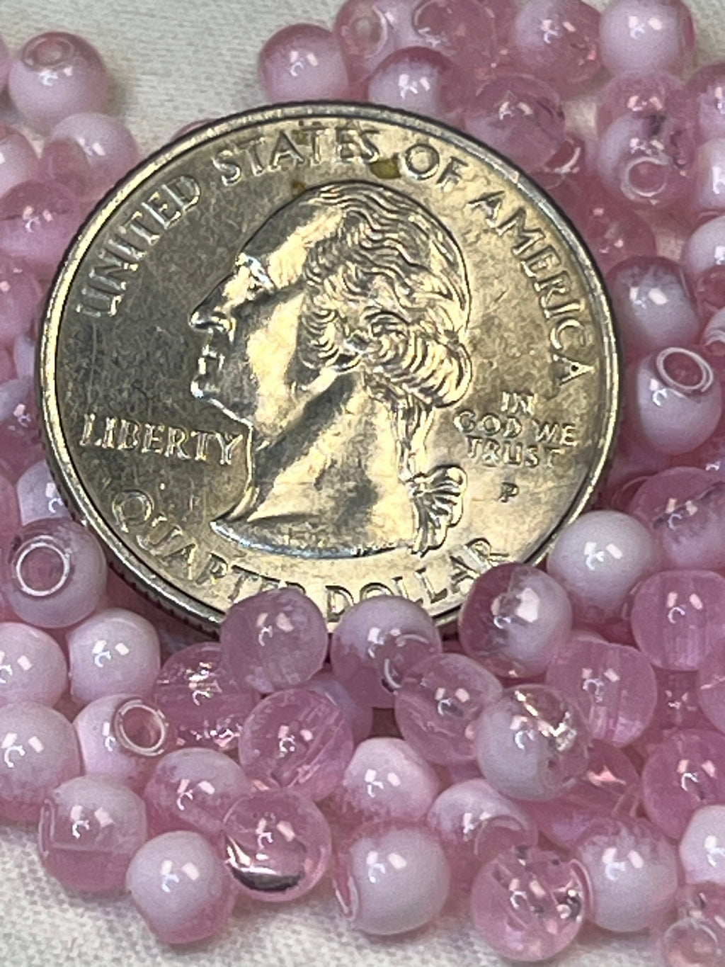 300 4.5mm two-tone crackle glass beads in flamingo and white.