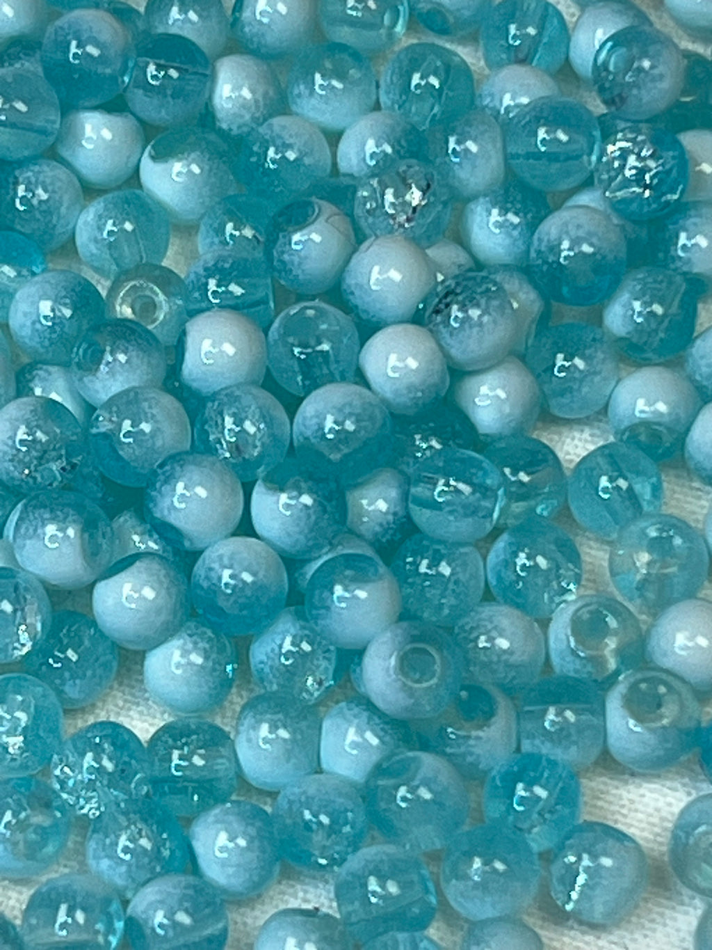 300 4.5mm two-tone crackle glass beads in turquoise and white.