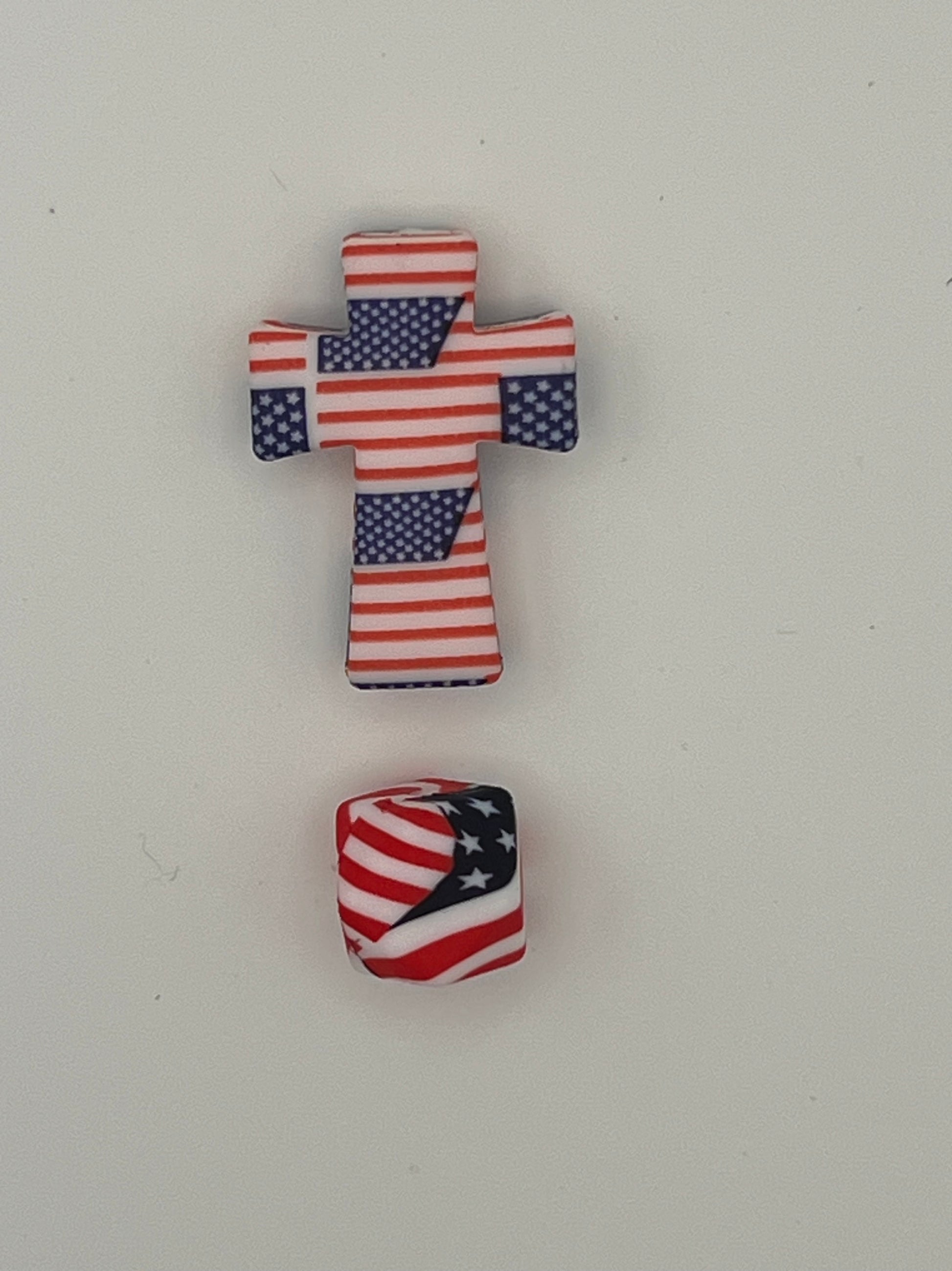 Silicone cross and hex beads with an Americana flag design.