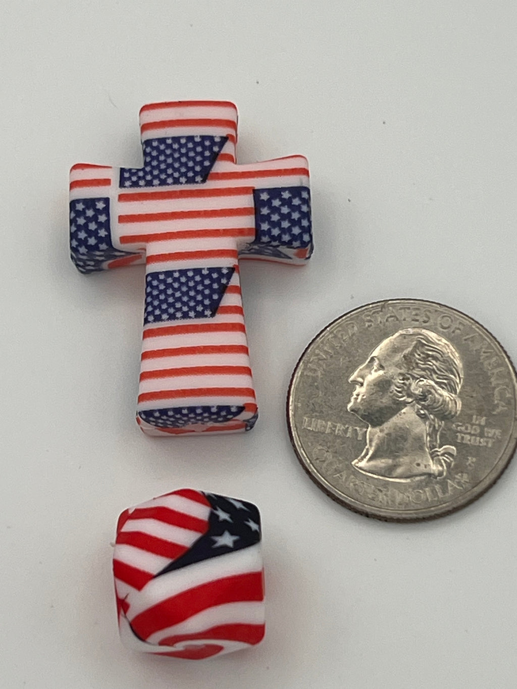 Silicone cross and hex beads with an Americana flag design.