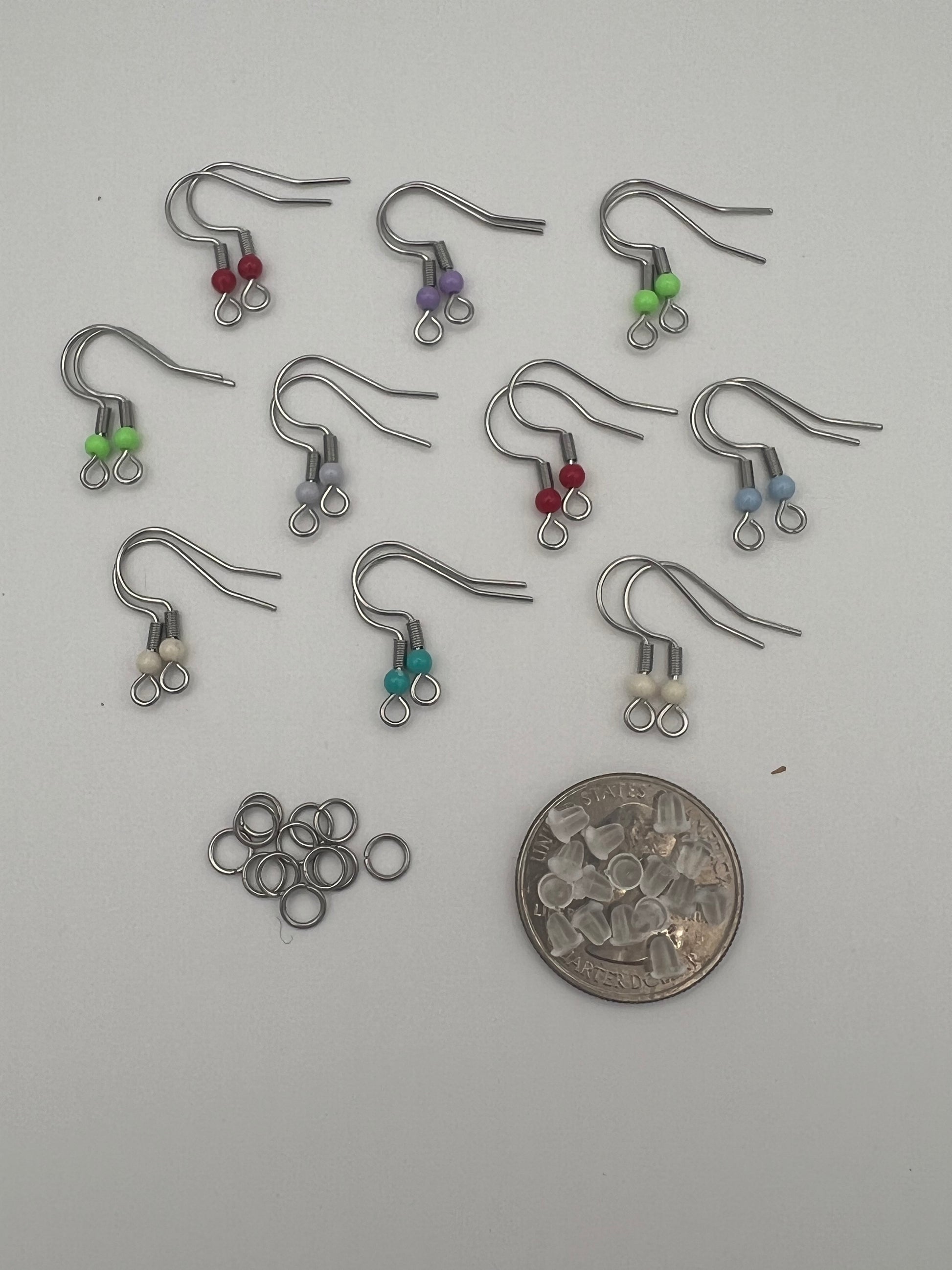 304 stainless steel ear wires with acrylic beads, silicone nuts, and jump rings.