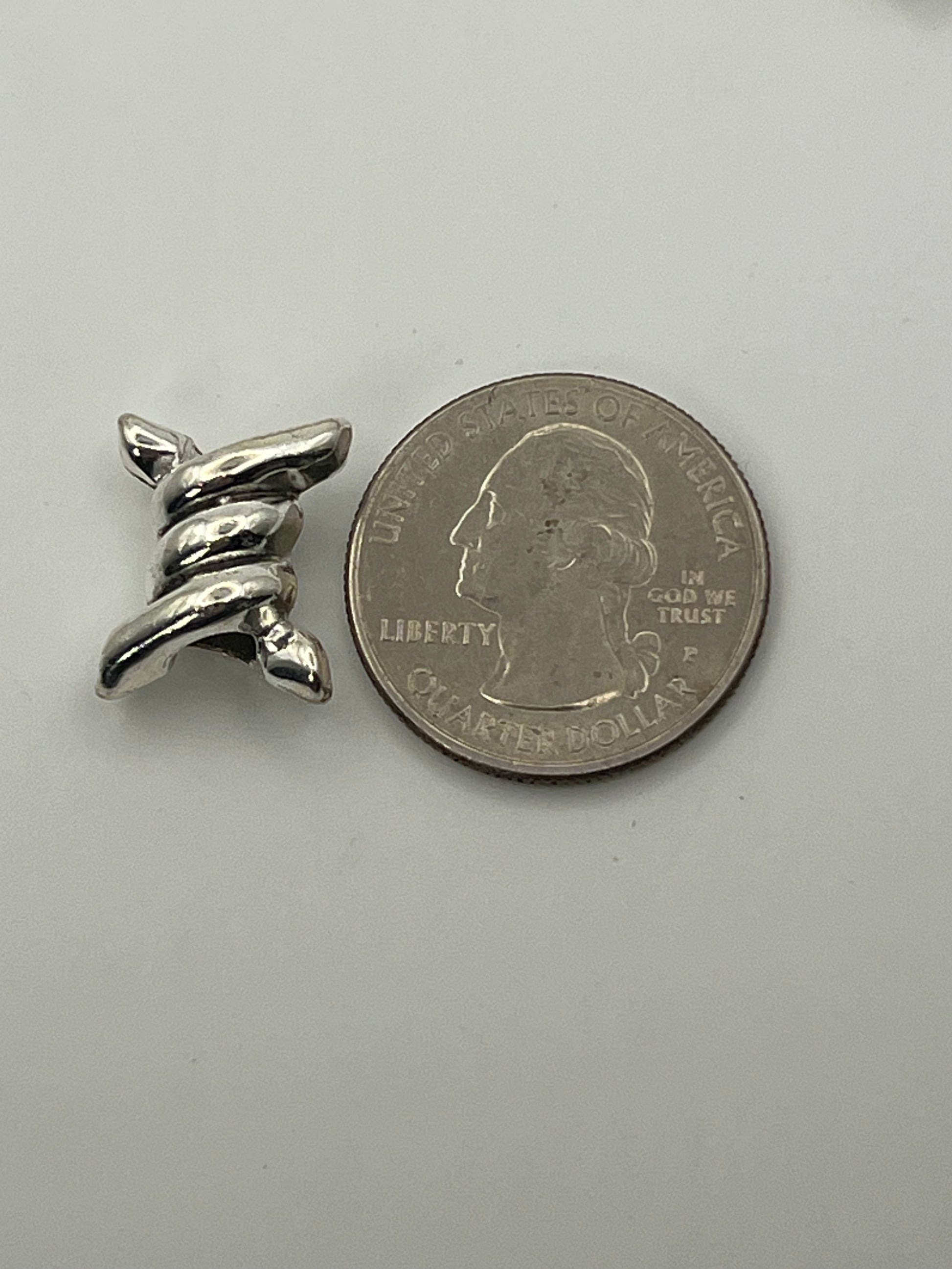 Tibetan style barbed wire European beads with a 4.5mm hole.