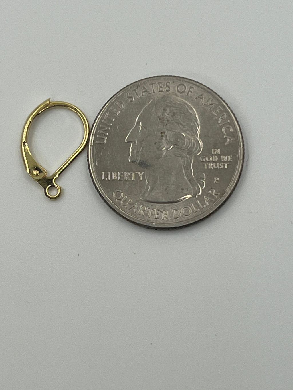 Gold-plated stainless steel leverback earring hooks with a coin for scale.