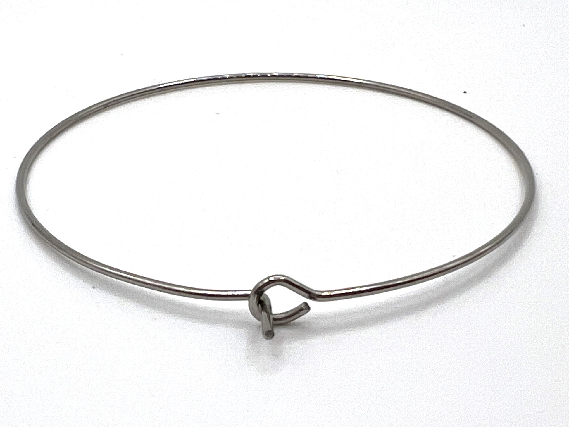 Silver stainless steel wine glass charm rings with a loop closure.