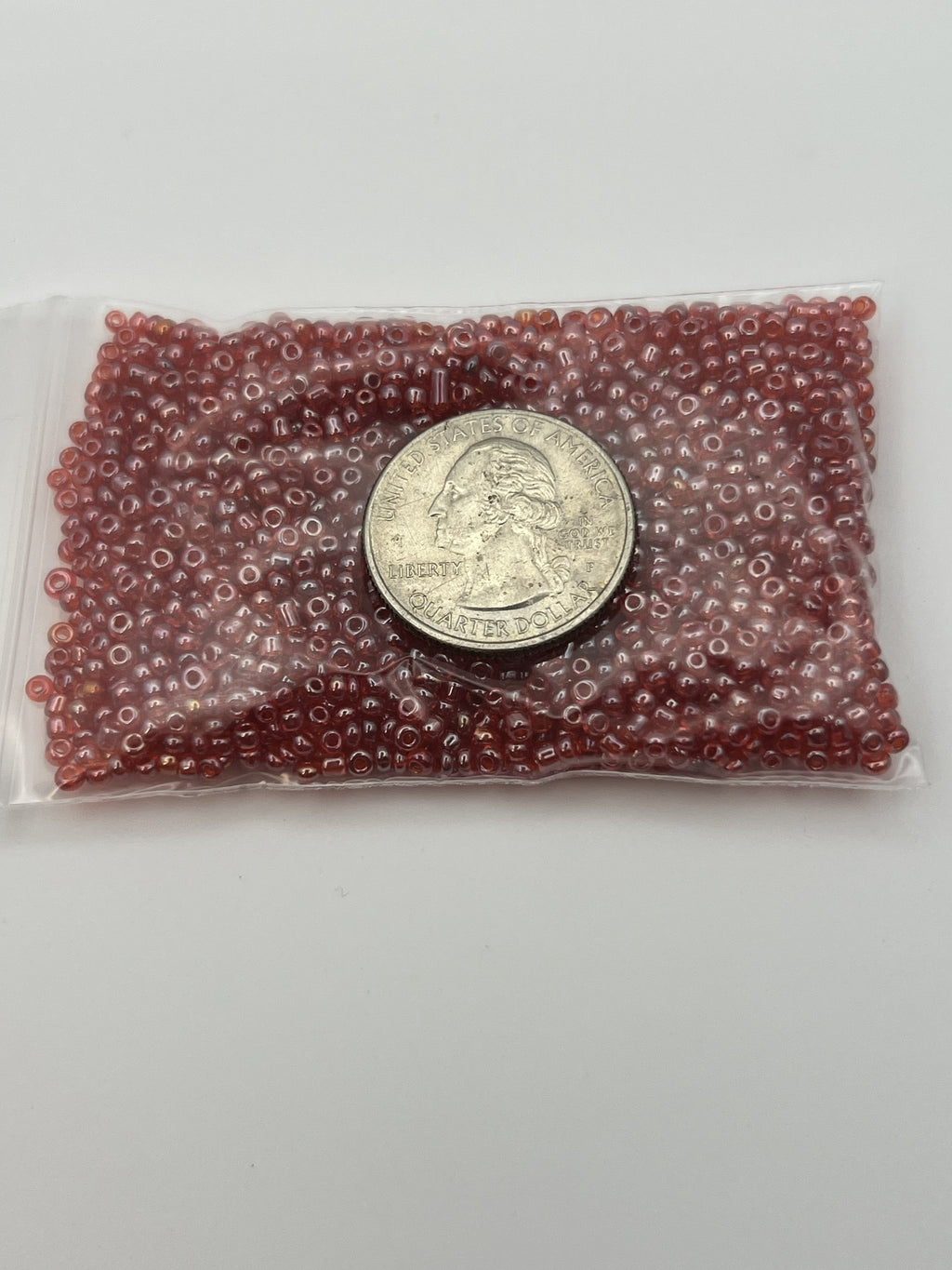 1oz. 12/0 Transparent Lustered Seed Beads Red