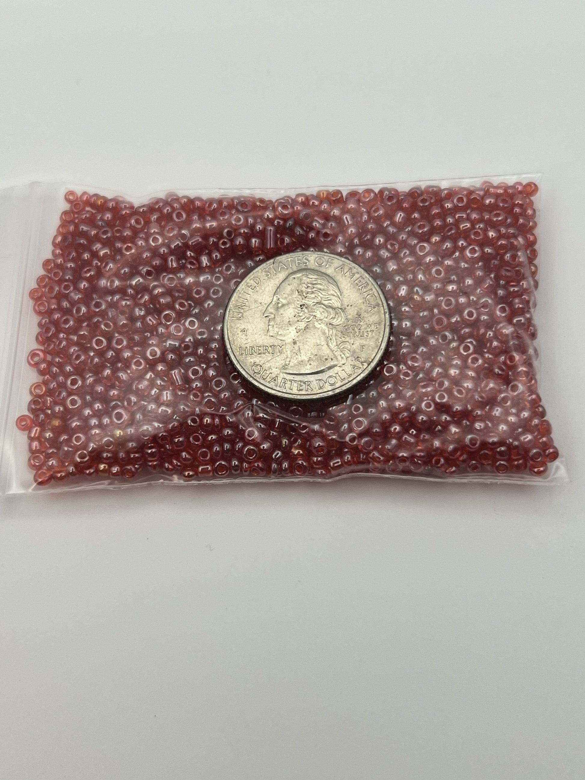 1oz. 12/0 Transparent Lustered Seed Beads Red