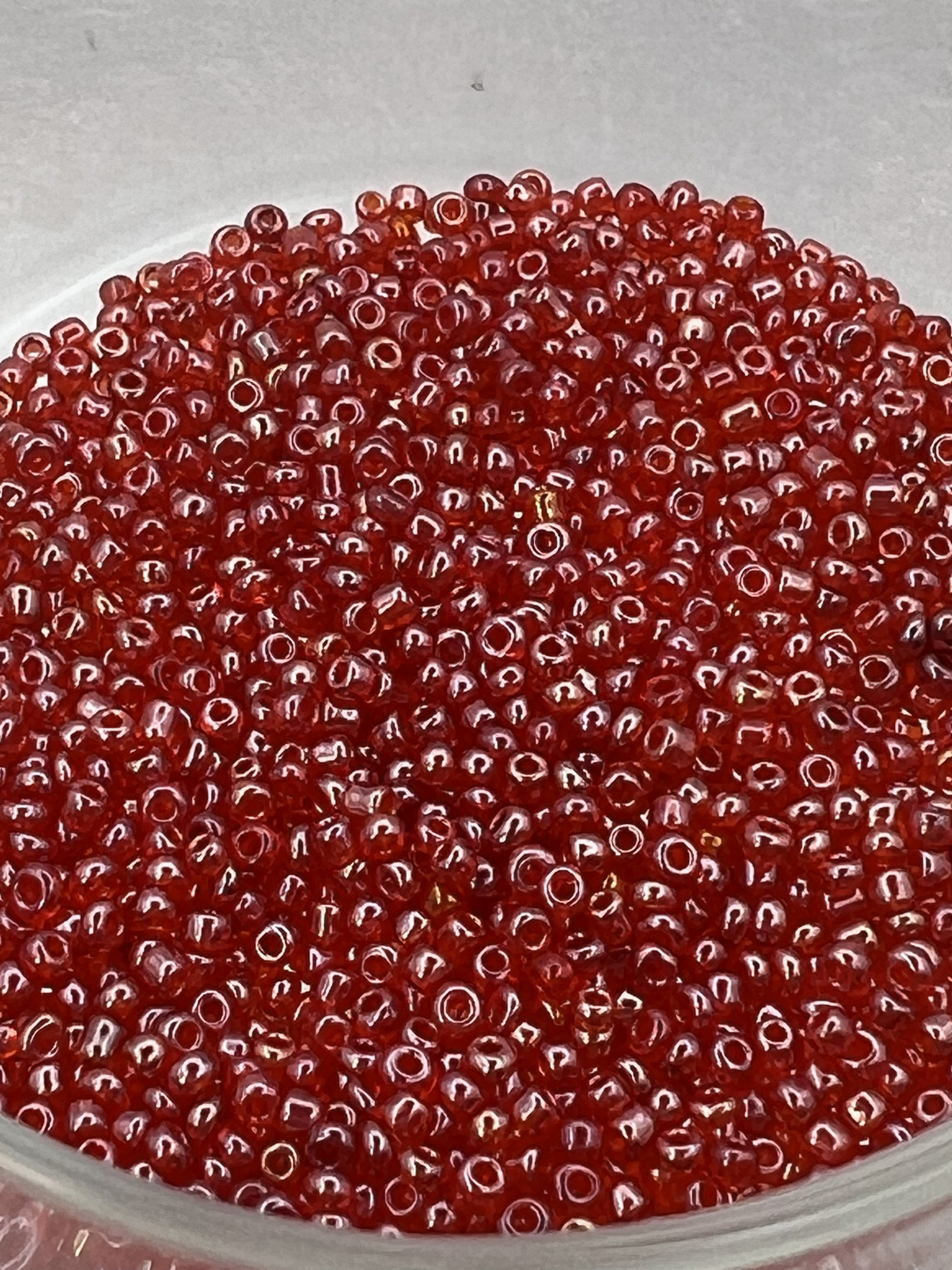 1oz. 12/0 Transparent Lustered Seed Beads Red