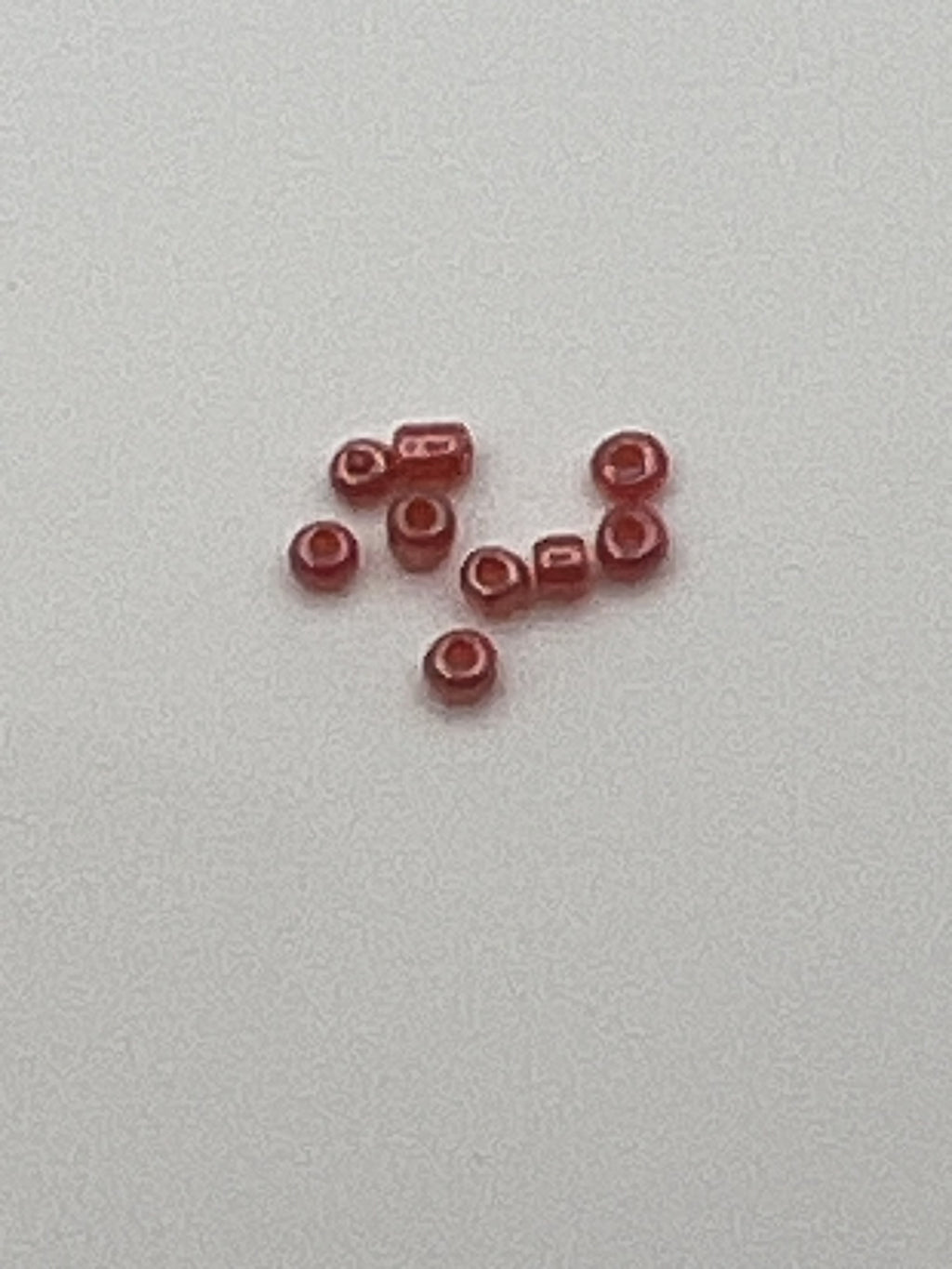 1oz. 12/0 Transparent Lustered Seed Beads Red