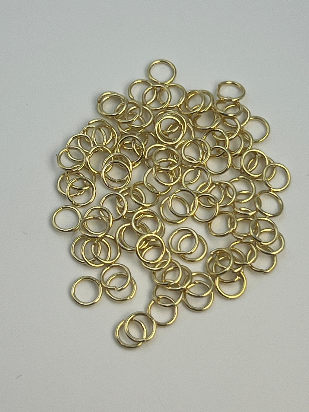 Golden 5mm 304 stainless steel jump rings, 100 count.