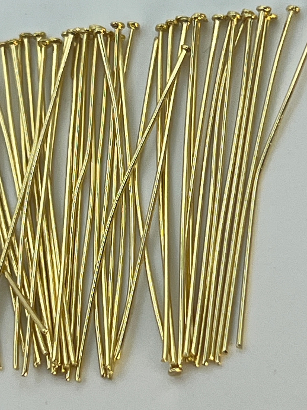 100 count of 30mm 18k gold plated stainless steel flat head pins.