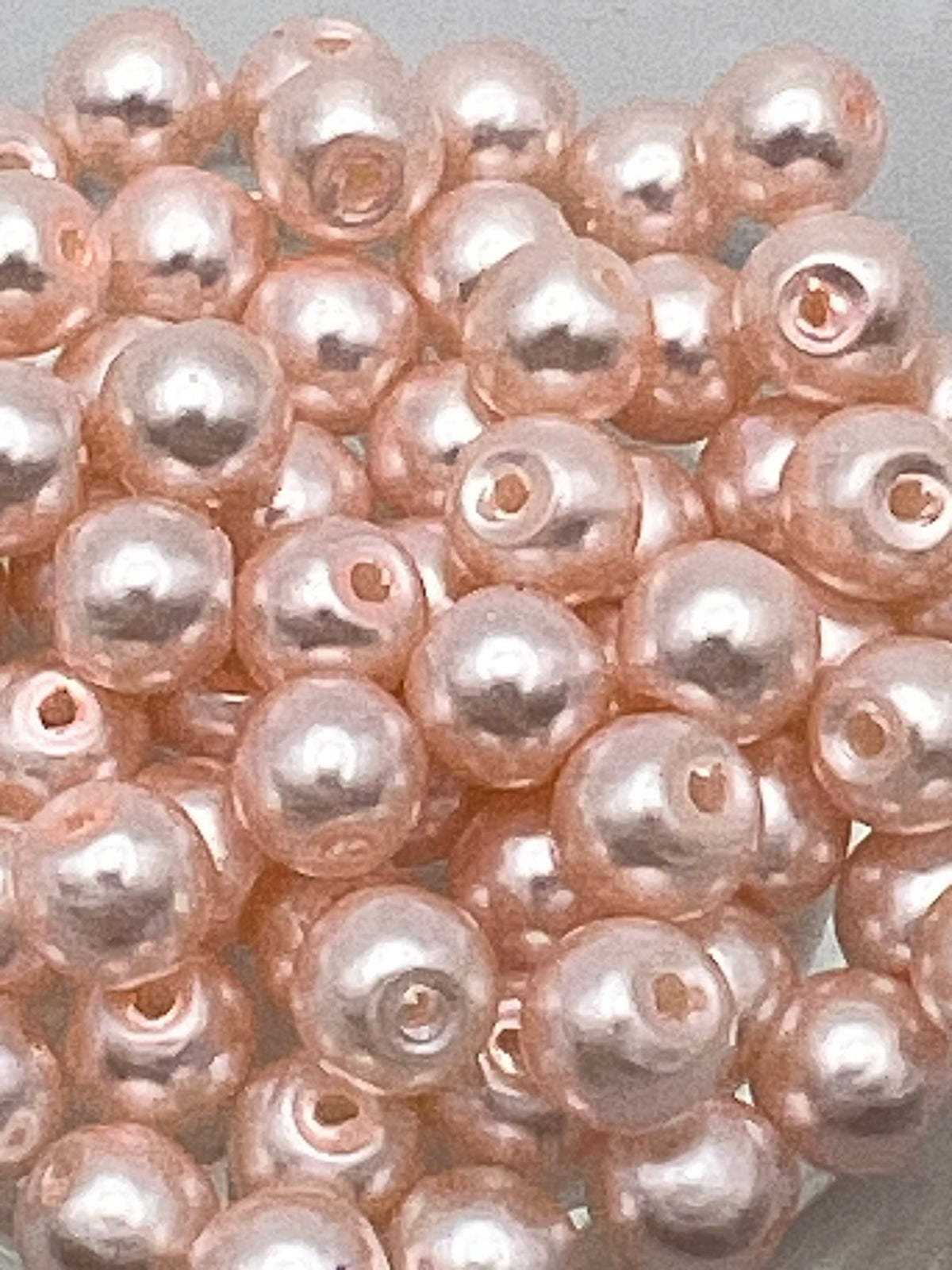 6mm Peach Puff glass pearl beads, 75 beads per bag.