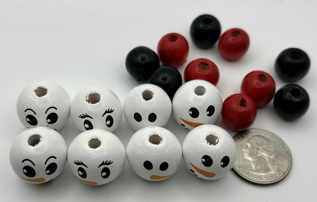 18-piece Christmas wood bead set with 8 snowman faces and 10 red and black accent beads.